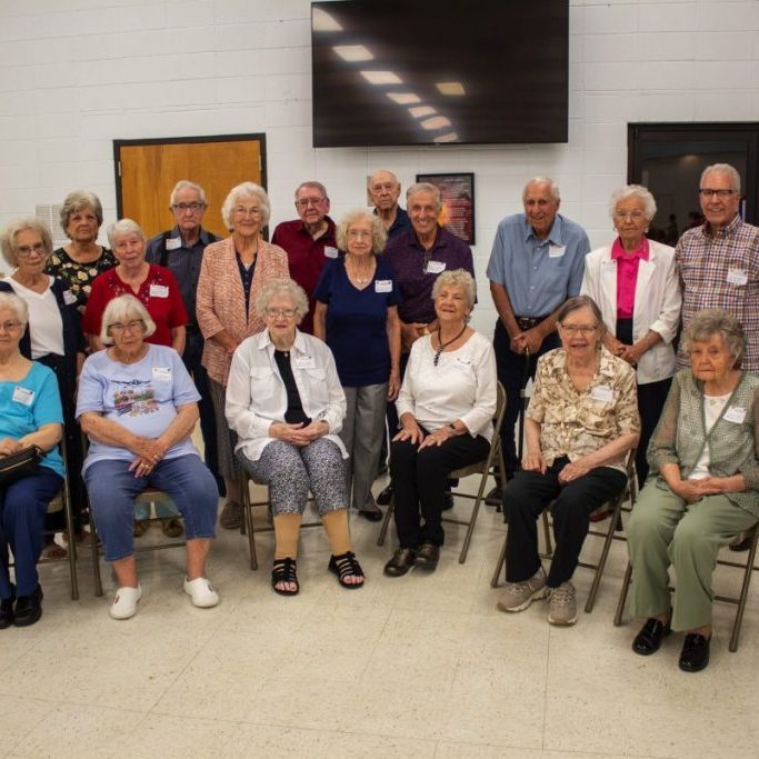 Six members of the class of 1956 attended, and were joined by other alumni from the 1950s. From left, seated, are: Dee Hood, Opal Beasley, Nita Lycke, Jane McKinney (‘56), Sylvia Bates and Margaret Burch (‘56); standing: Sue Hadley, Donna Gibson, Bernadean Schultz, Gene Scott, Myrna Friend, Fred Brookshire, Carolyn Lyons, Mac Benson, Dale Mansfield (‘56), Don Gibson (‘56), Rosalee Scott (‘56) and Norman Neal (‘56).