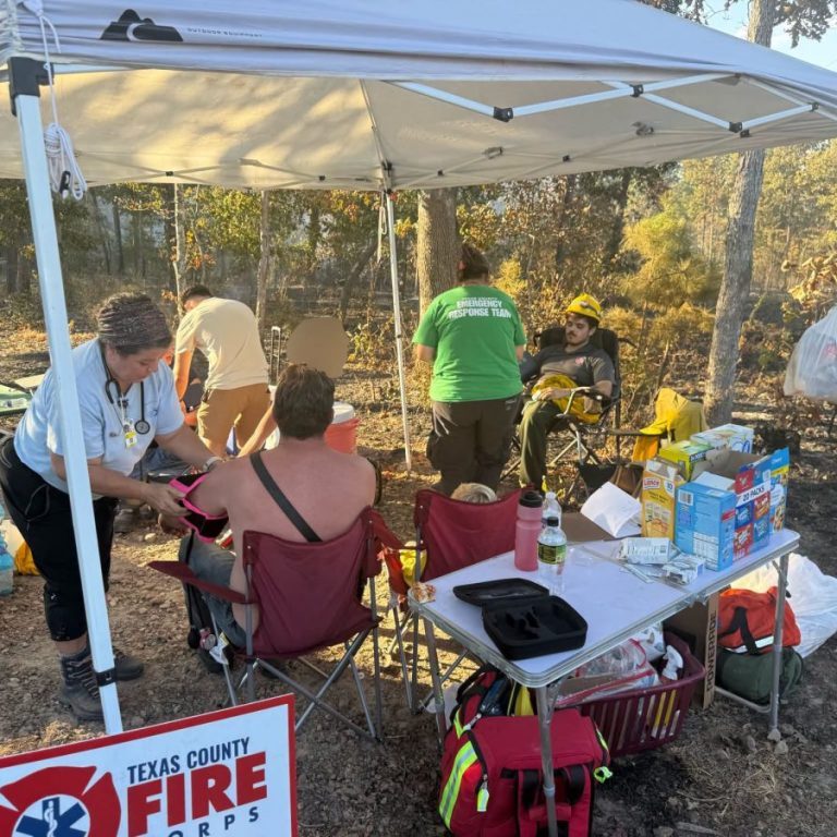 Photo courtesy of TCERT Firefighters were treated for heat exhaustion at an area set up by the TCERT team.